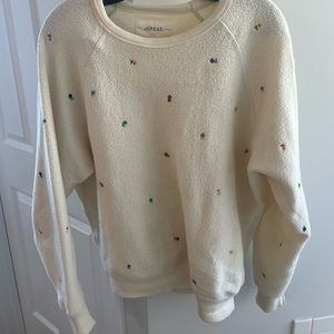 The Great. College sweatshirt with flowers